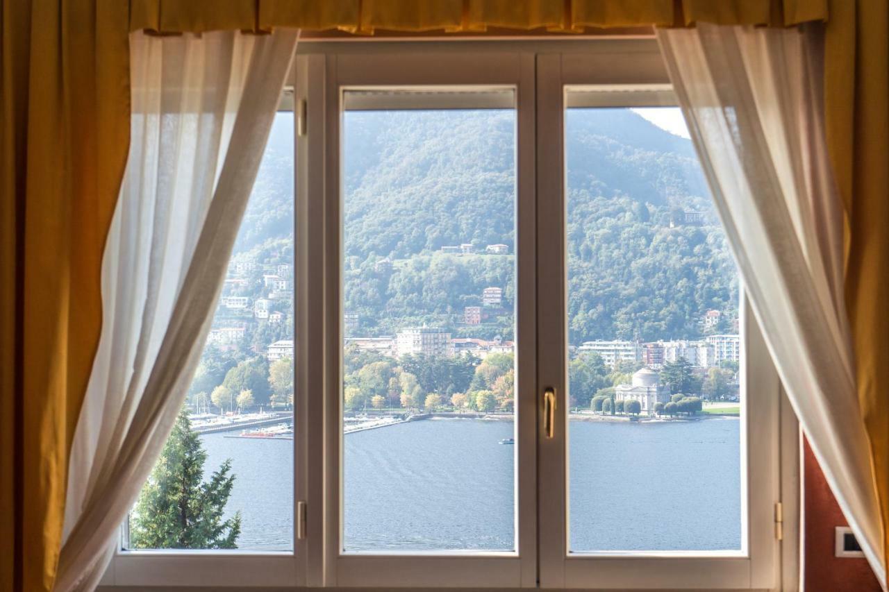Lo Specchio Sul Lago - The House Of Travelers Côme Esterno foto